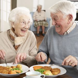 Senior Couple Enjoying Meal Together
